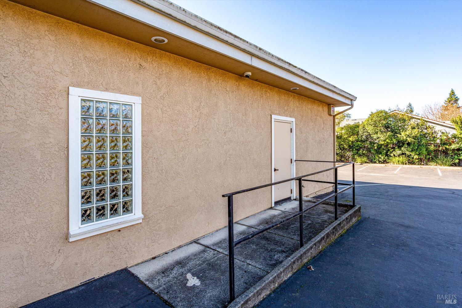 1105 University Avenue Healdsburg, CA 95448 - Photo 24 of 29 a view of staircase with wooden floor and chair