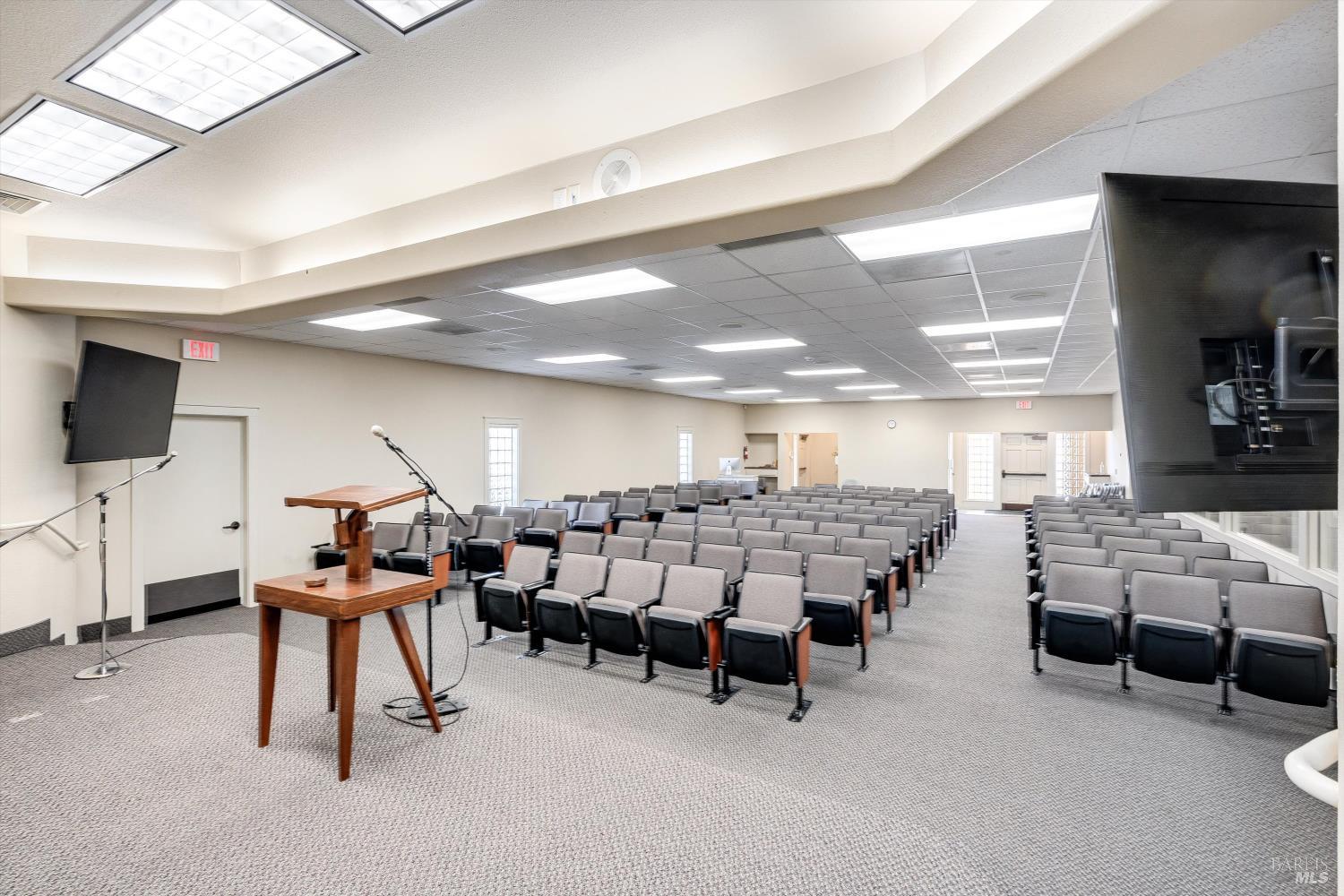 1105 University Avenue Healdsburg, CA 95448 - Photo 9 of 29 a living room with lots of furniture and a flat screen tv