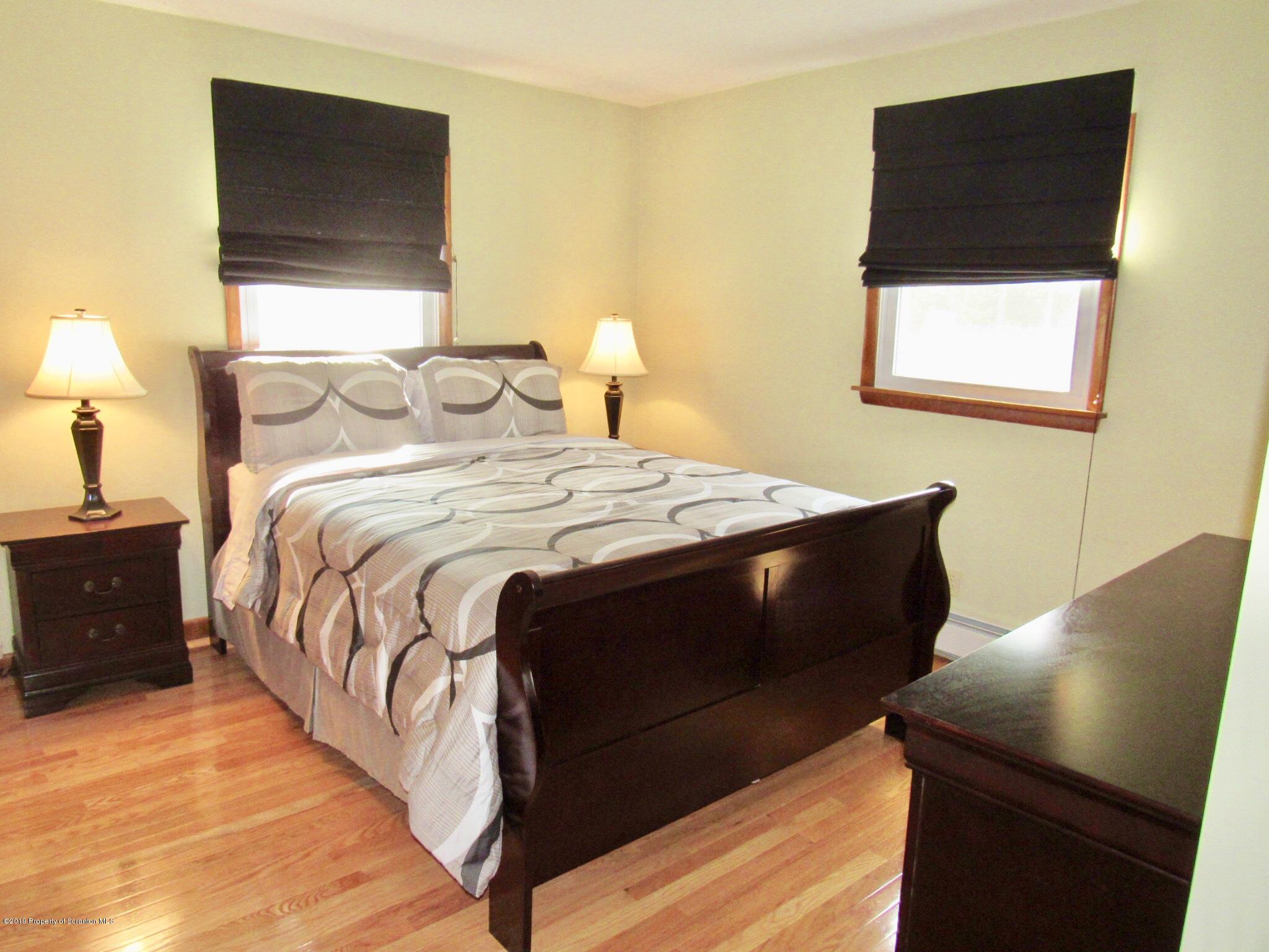 76 Ripplebrook Road Tunkhannock, PA 18657 - Photo 17 of 37 a bedroom with a bed and a window