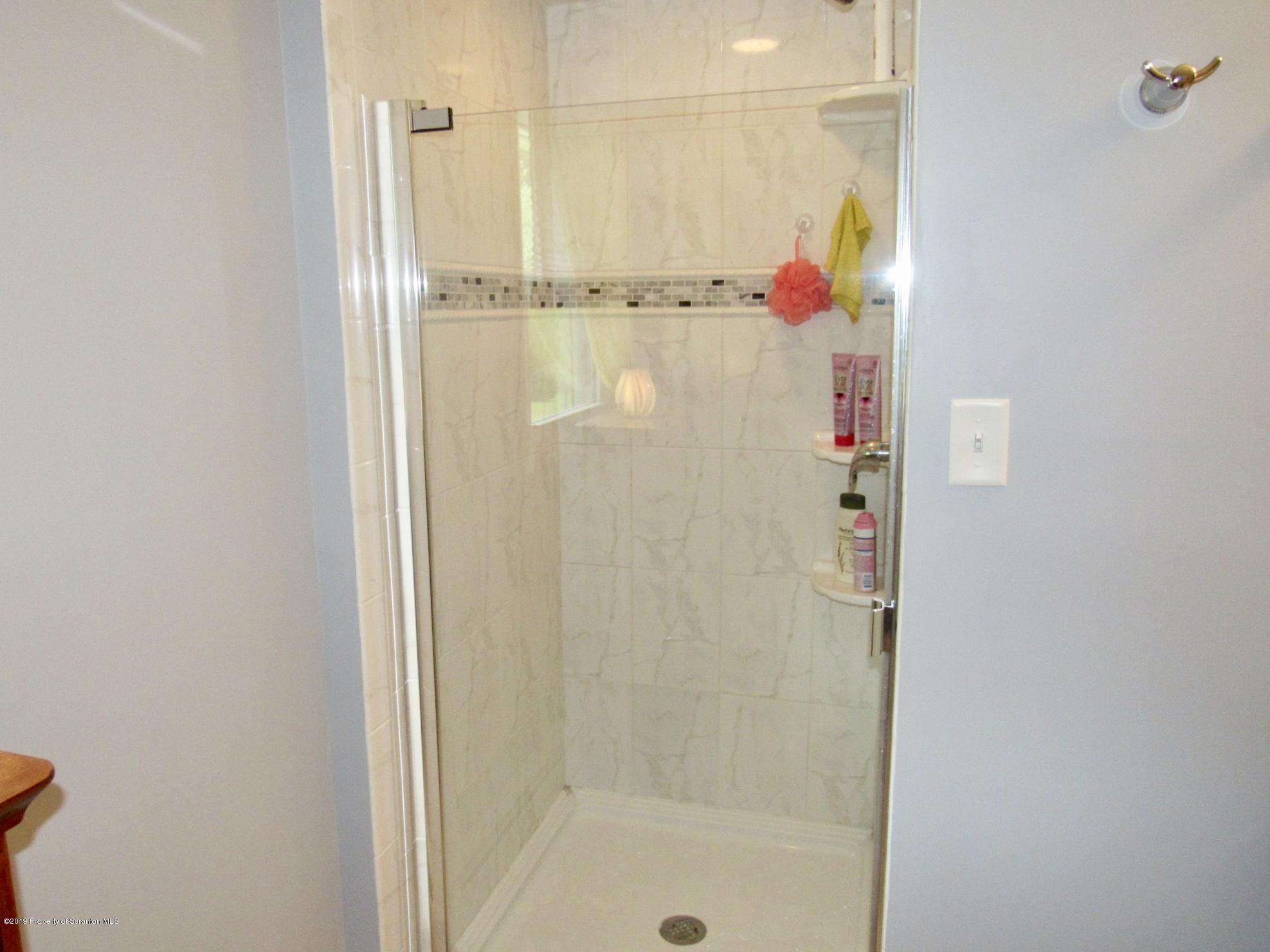 76 Ripplebrook Road Tunkhannock, PA 18657 - Photo 20 of 37 a bathroom with a shower