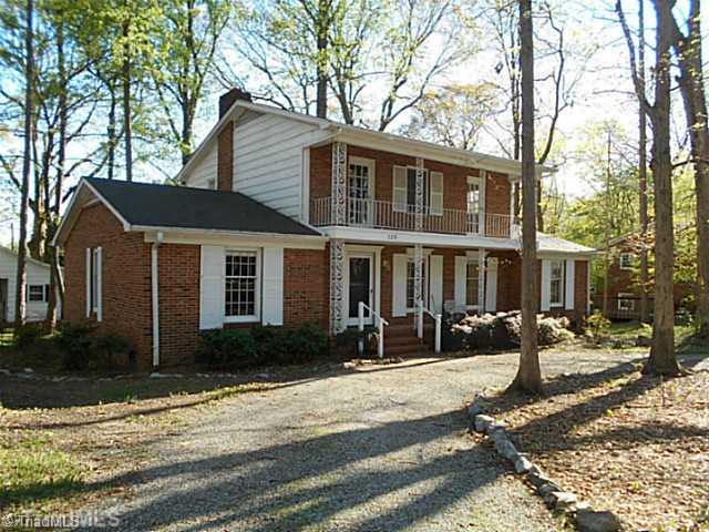 123 Sagewood Road Jamestown, NC 27282 - Photo 1 of 16 Exterior Front. Beautiful brick home located in Cedarwood with desirable front landscaping.