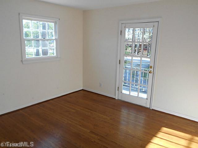 123 Sagewood Road Jamestown, NC 27282 - Photo 11 of 16 4th Bedroom. 4th bedroom is to the left of the house and has its own private access to the balcony.