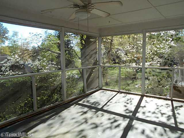 123 Sagewood Road Jamestown, NC 27282 - Photo 12 of 16 Screened Porch. Enjoy your morning coffee while sitting in your covered porch and enjoying the lovely scenery.