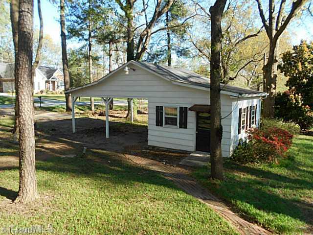 123 Sagewood Road Jamestown, NC 27282 - Photo 15 of 16 In-Law Suite. Guest house is attached to carport; has brick walkway that leads to the main house.