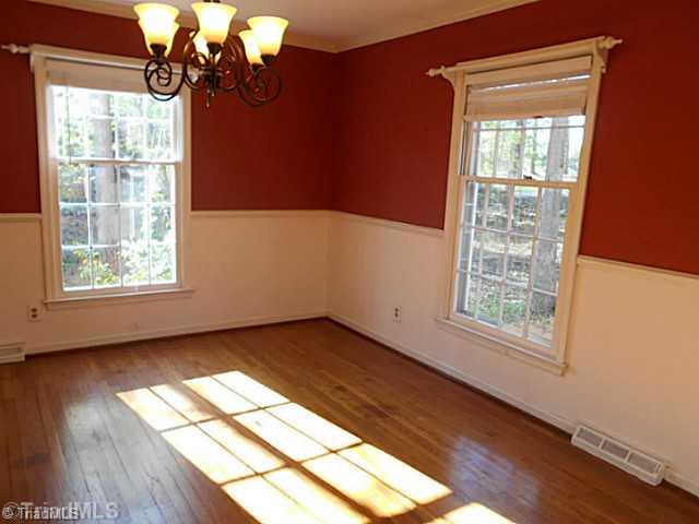 123 Sagewood Road Jamestown, NC 27282 - Photo 3 of 16 Dining Room. The cozy dining room connects to both the kitchen and he living room making this the ideal spot for entertaining!