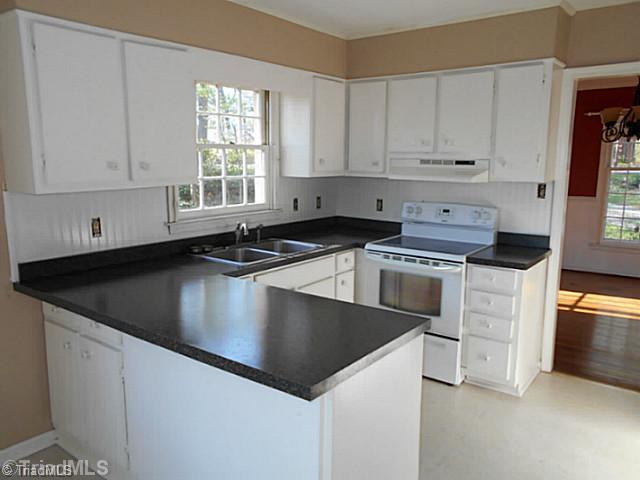 123 Sagewood Road Jamestown, NC 27282 - Photo 4 of 16 Kitchen. Kitchen has new countertops as well as ample cabinet storage for all of those fancy kitchen gadgets!