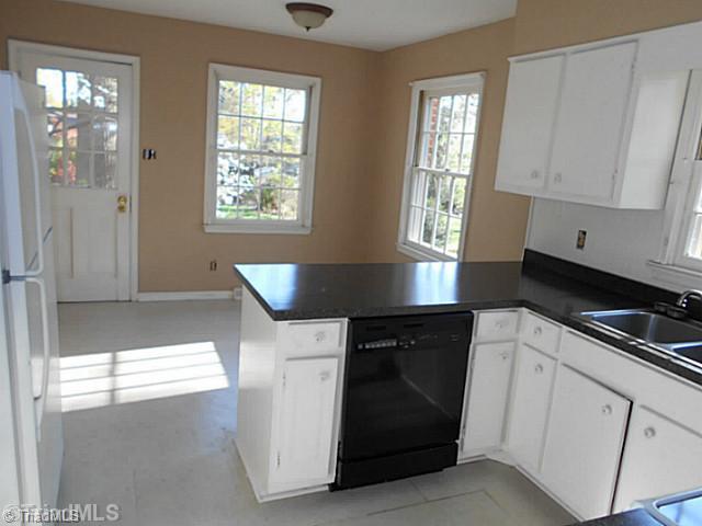 123 Sagewood Road Jamestown, NC 27282 - Photo 5 of 16 Kitchen. Eat-in breakfast nook is full of natural light and makes the perfect spot for breakfast, lunch, or dinner.