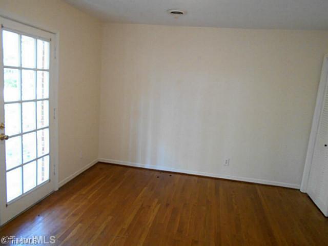123 Sagewood Road Jamestown, NC 27282 - Photo 10 of 16 3rd Bedroom. 3rd bedroom is on the right side of the house, has a large closet, and private entrance to balcony.