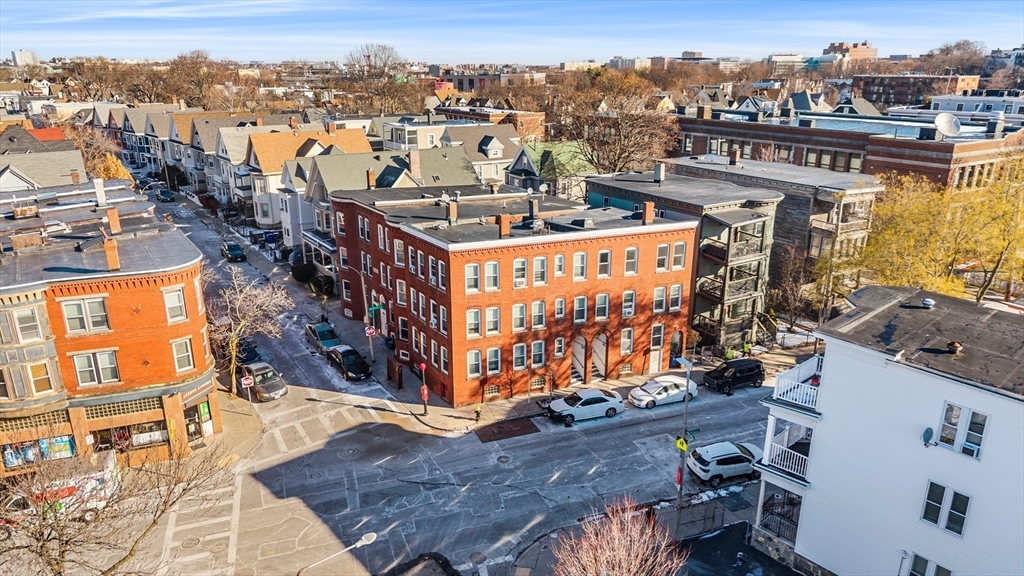 86 Savin Hill Avenue, Unit 1 Boston, MA 02125 - Photo 13 of 17 a view of a city with tall buildings