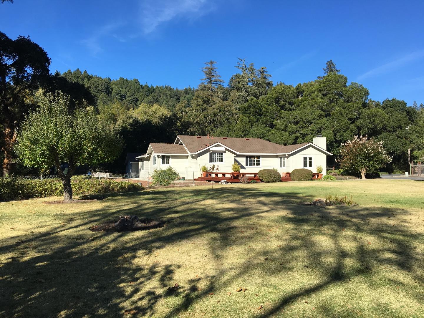 150 Nelson Road Scotts Valley, CA 95066 - Photo 5 of 11 a view of a house with a yard
