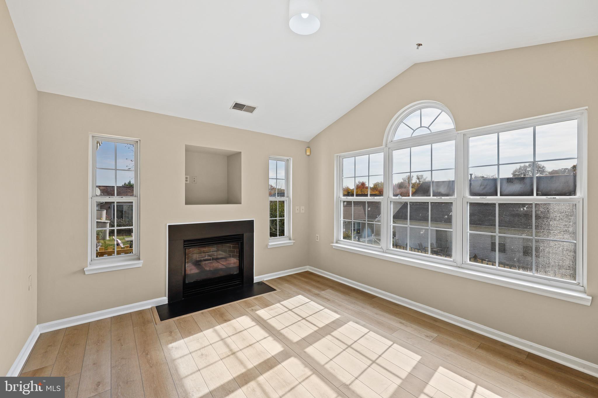 7409 Sandy Spring Road Laurel, MD 20707 - Photo 27 of 52 Family room with fireplace