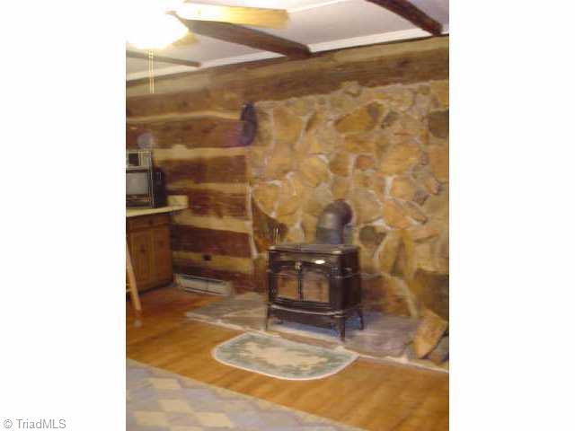1220 Tomahawk Road Westfield, NC 27053 - Photo 2 of 8 Other. Relax by the woodstove.