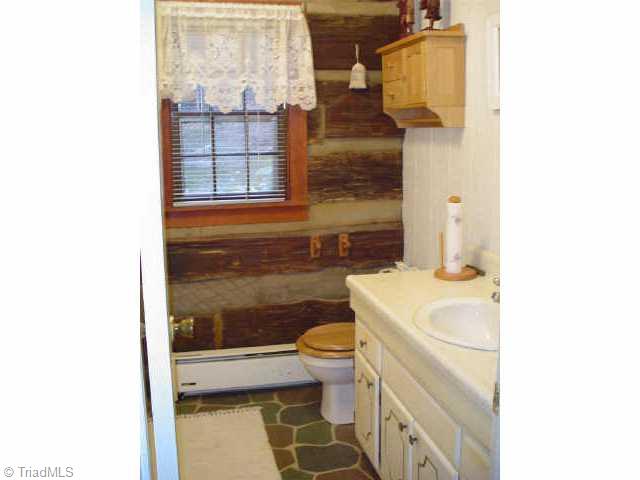 1220 Tomahawk Road Westfield, NC 27053 - Photo 4 of 8 Other. Bath with stone floor.