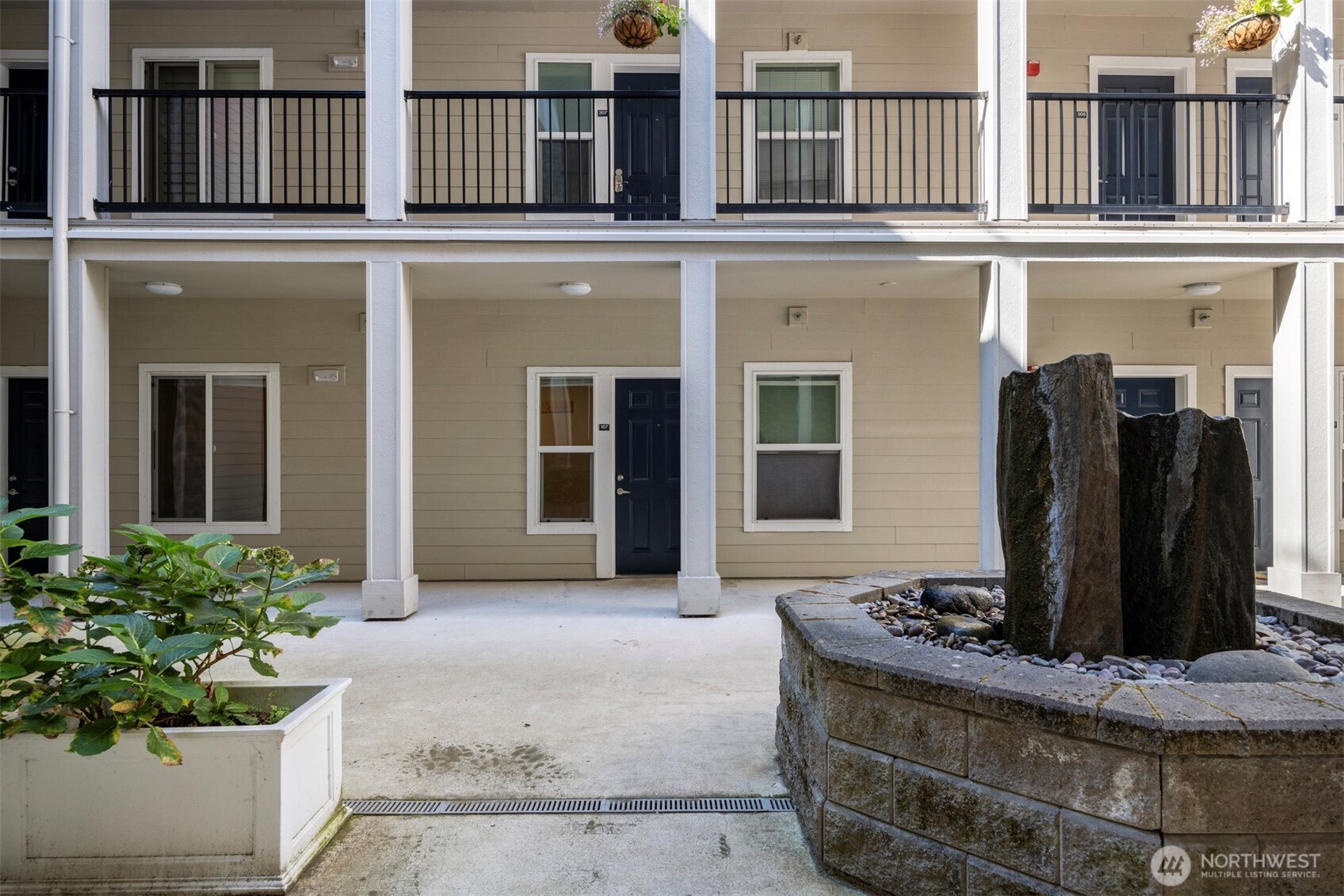 1031 North State Street, Unit 107 Bellingham, WA 98225 - Photo 27 of 33 front view of a building with a entryway