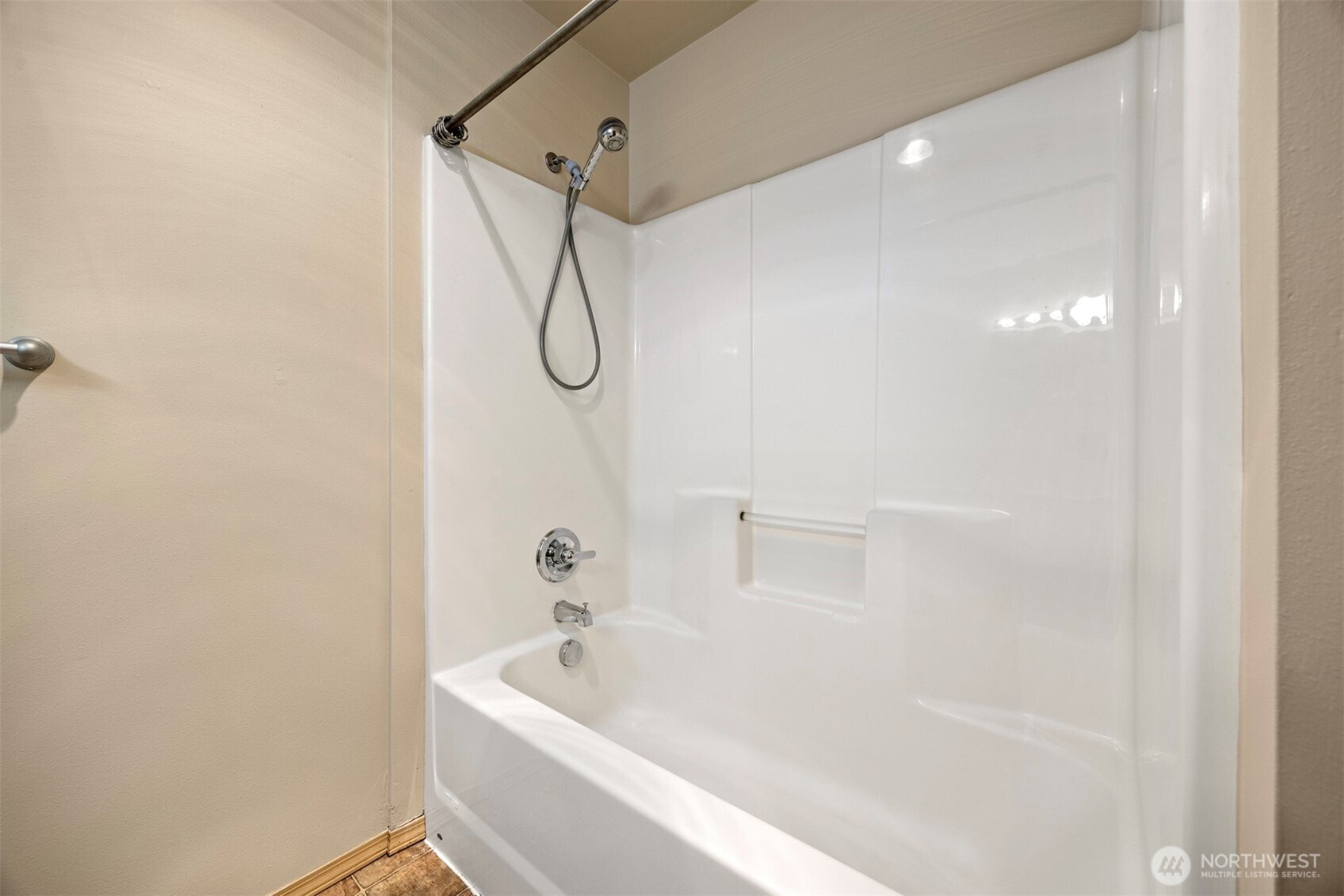 1031 North State Street, Unit 107 Bellingham, WA 98225 - Photo 10 of 33 a bathroom with a bath tub with a shower