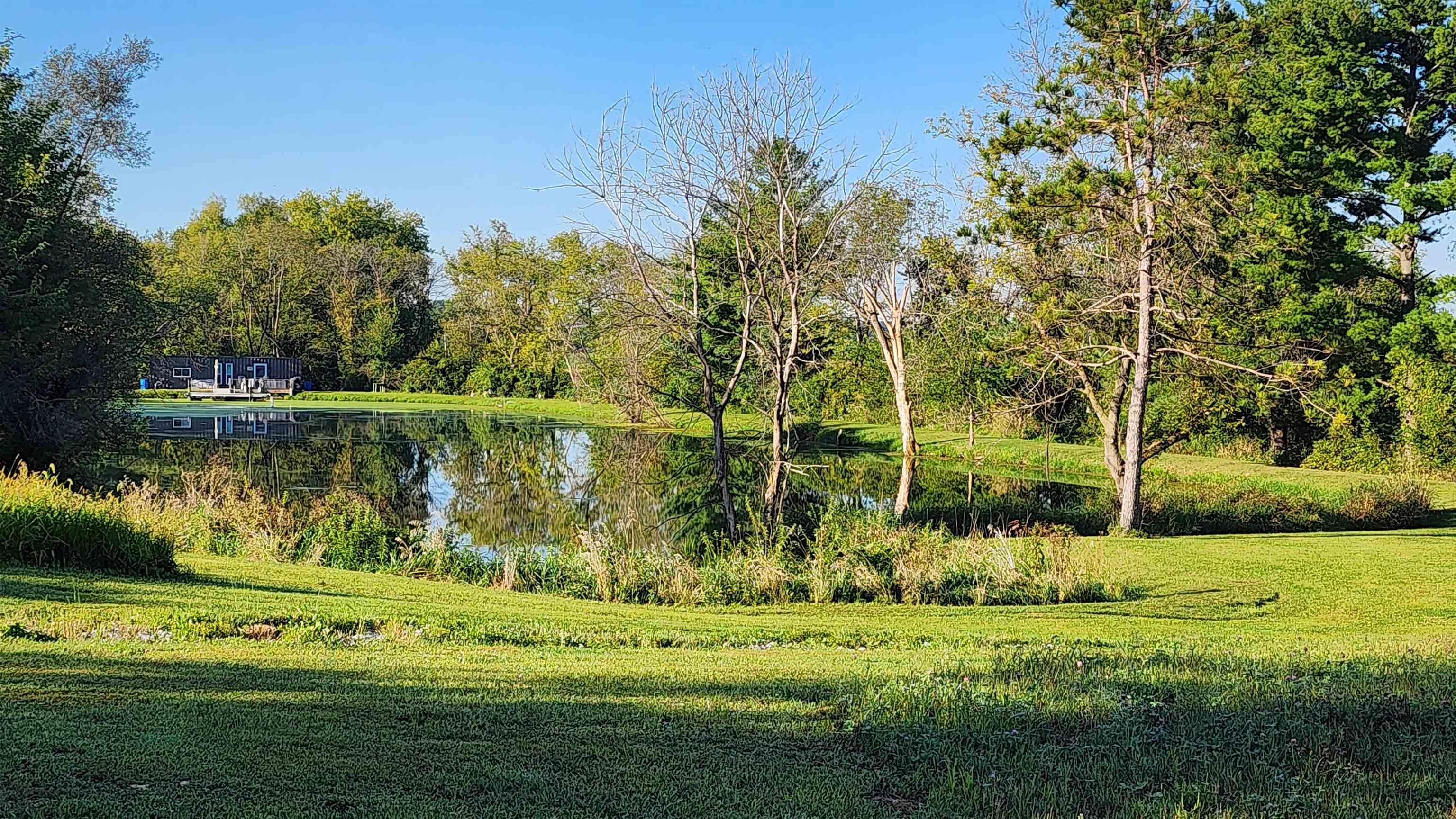 0 North Pecatonica Road Pecatonica, IL 61063 - Photo 22 of 24 a view of a lake with a big yard