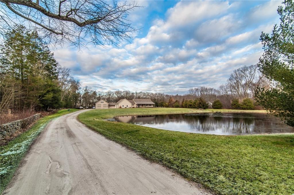 153 Branch Hill Road Preston, CT 06365 - Photo 1 of 1 a view of a lake in front of building
