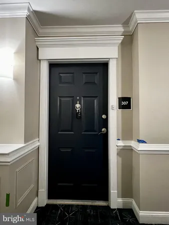 a bathroom with a shower and a sink