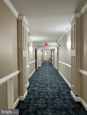 a bathroom with a glass door shower