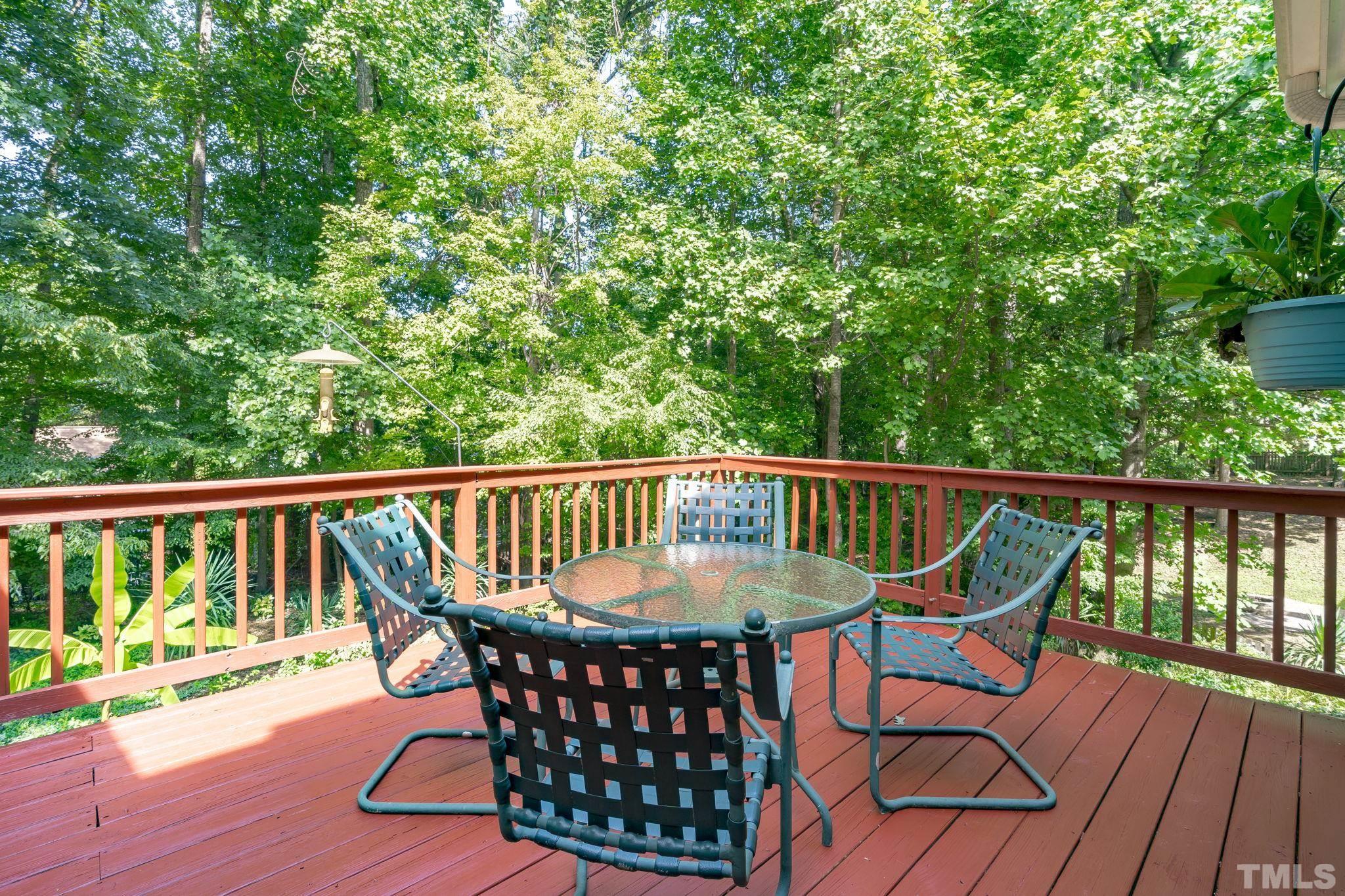 7705 Tylerton Drive Raleigh, NC 27613 - Photo 25 of 35 a view of a two chairs in the deck