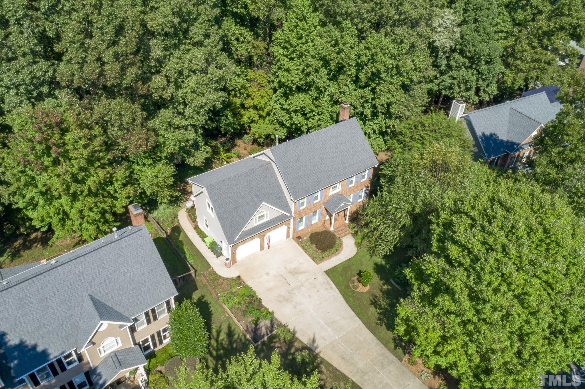 7705 Tylerton Drive Raleigh, NC 27613 - Photo 30 of 35 an aerial view of a house with a yard