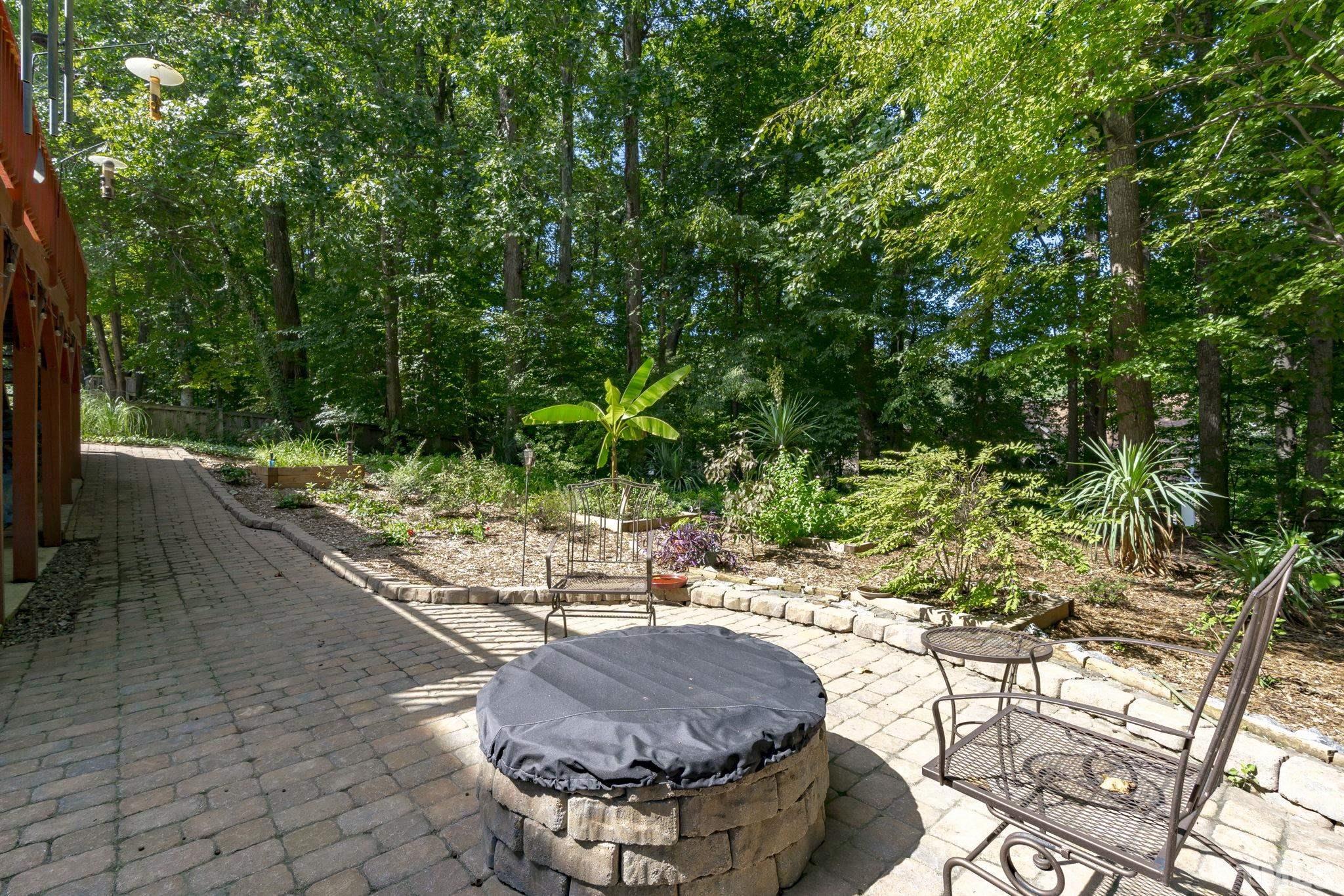 7705 Tylerton Drive Raleigh, NC 27613 - Photo 31 of 35 a view of an outdoor sitting area