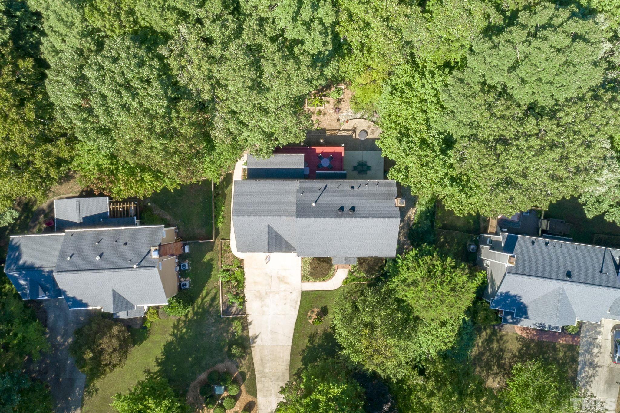 7705 Tylerton Drive Raleigh, NC 27613 - Photo 33 of 35 an aerial view of a house with a yard