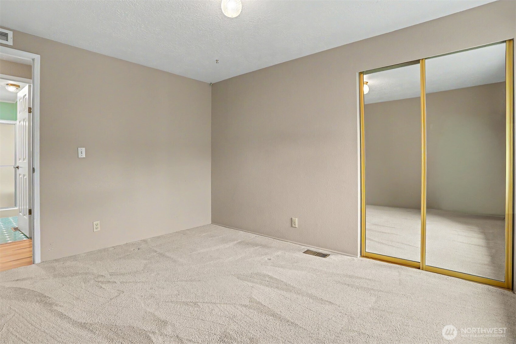 905 243rd Street Southwest Bothell, WA 98021 - Photo 26 of 37 wooden floor and closet in a room