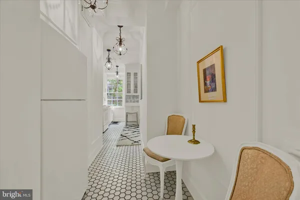 a bedroom with a sink and a mirror