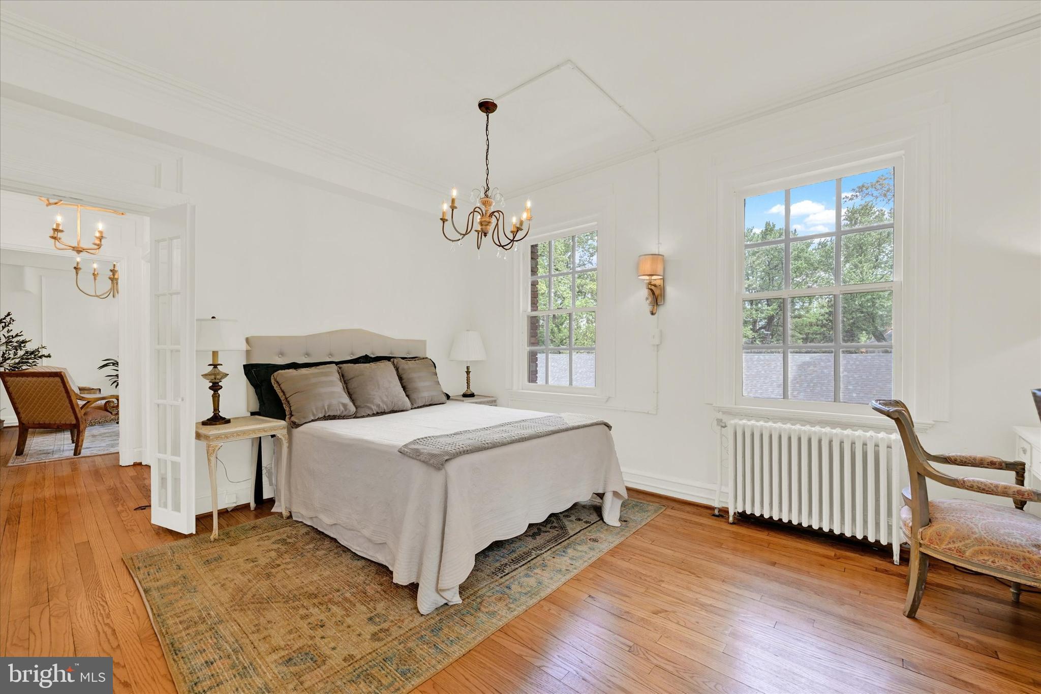 6 Upland Road, Unit Q3 Baltimore, MD 21210 - Photo 19 of 27 a bed room with a bed and a chair