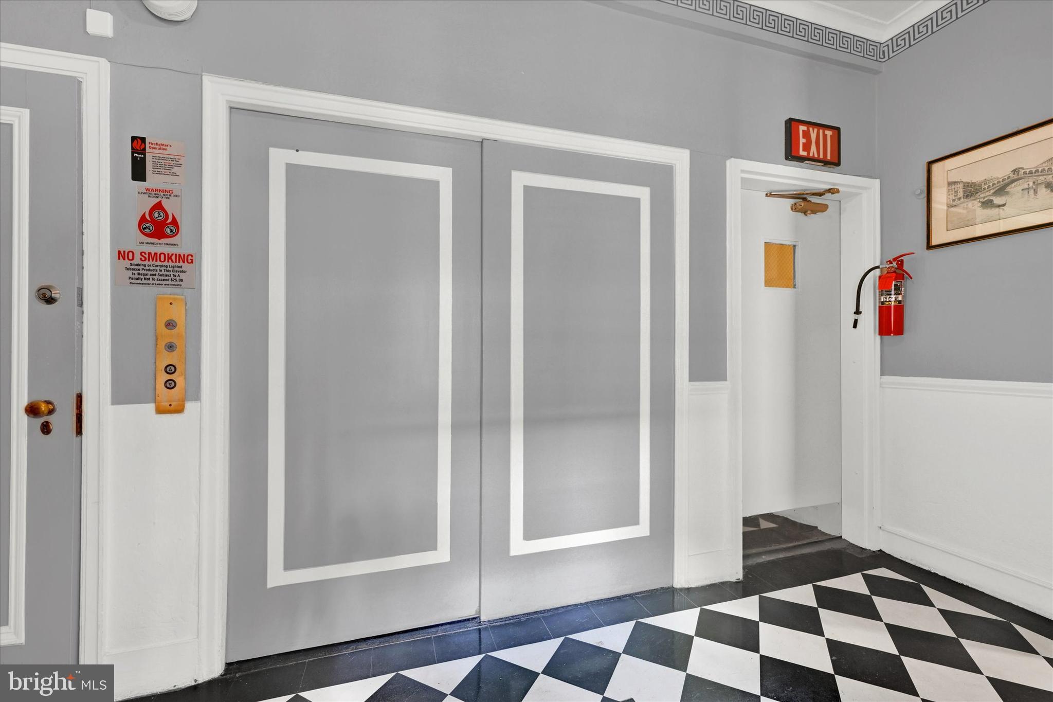 6 Upland Road, Unit Q3 Baltimore, MD 21210 - Photo 22 of 27 a walk in closet with wooden floor