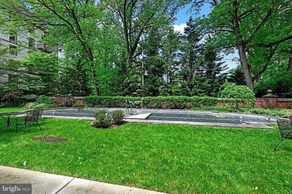 a view of backyard with a sitting area