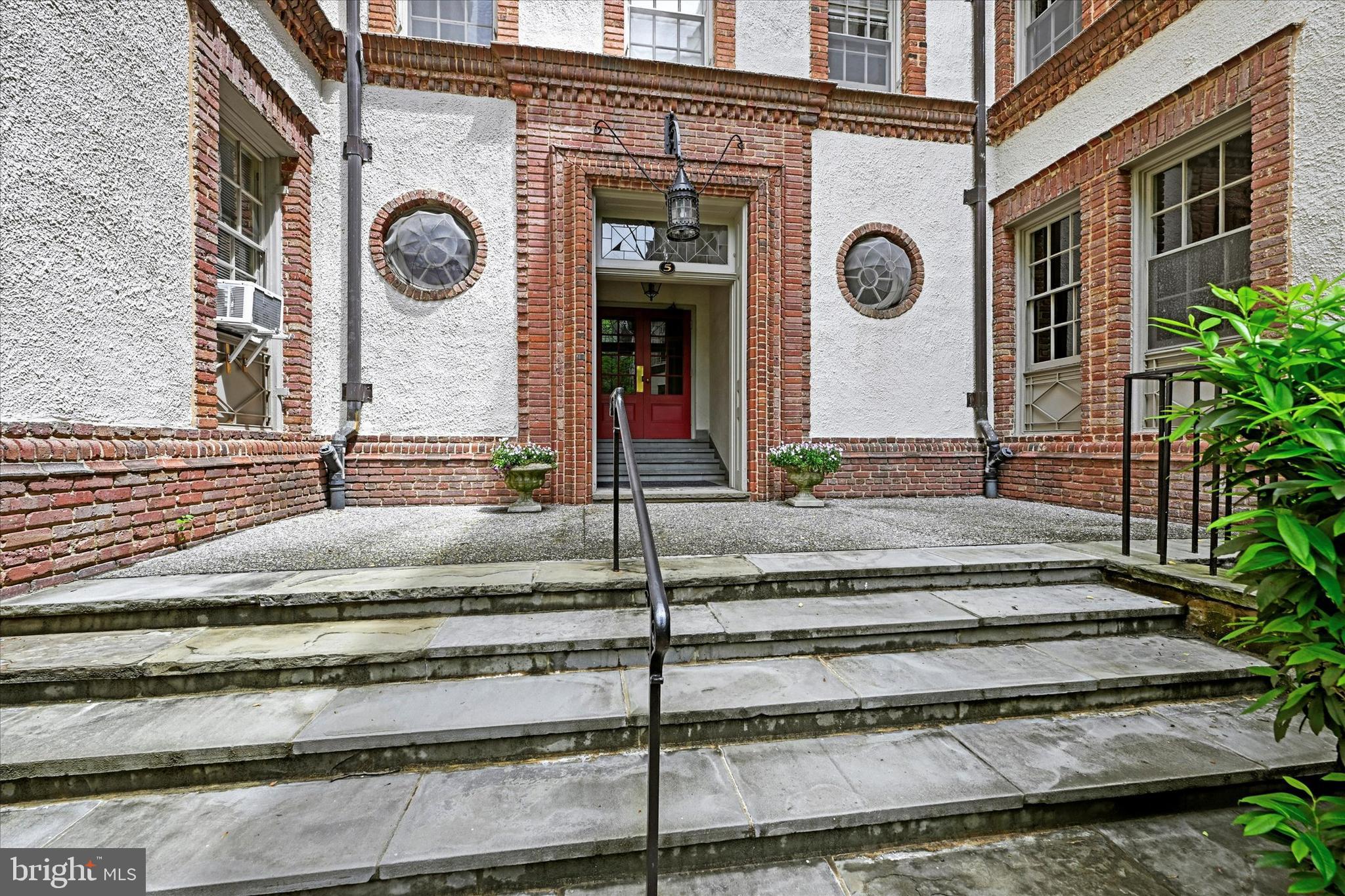 6 Upland Road, Unit Q3 Baltimore, MD 21210 - Photo 4 of 27 a view of a house with a large windows