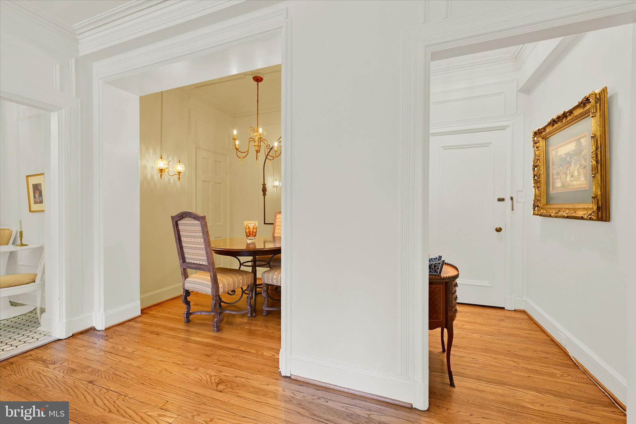 6 Upland Road, Unit Q3 Baltimore, MD 21210 - Photo 5 of 27 a view of a room with wooden floor and a table
