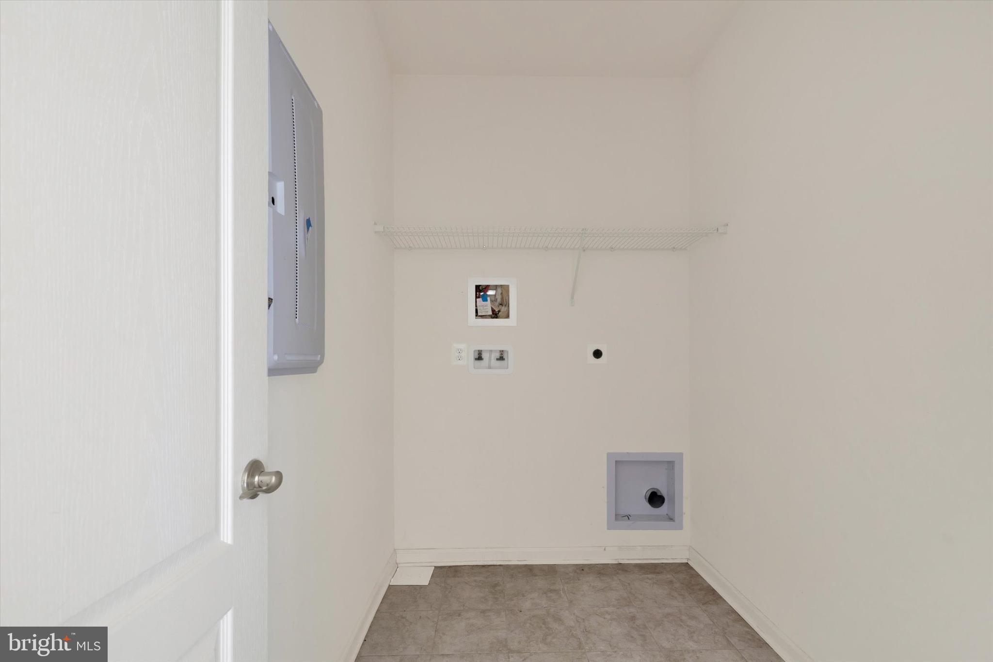 31407 Valley Green Road Millville, DE 19967 - Photo 6 of 28 First floor laundry area