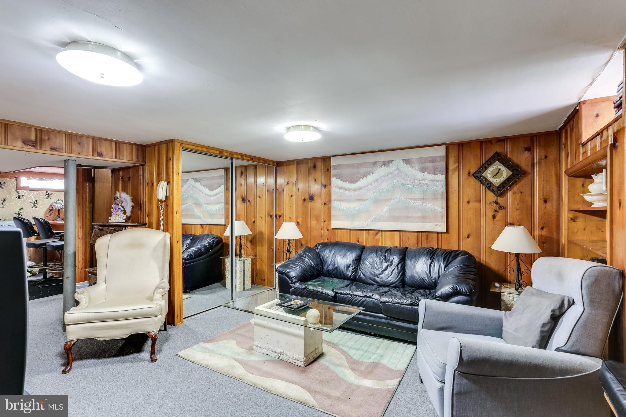1128 Kevin Road Baltimore, MD 21229 - Photo 19 of 23 Knotty pine clubroom