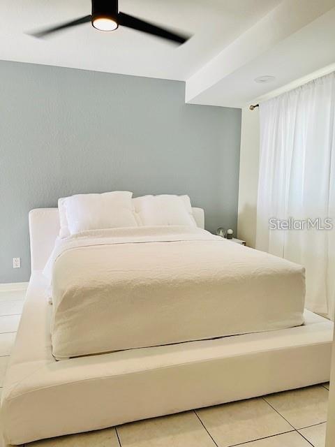 10172 63rd Avenue North Seminole, FL 33772 - Photo 11 of 24 a large white bed in a room