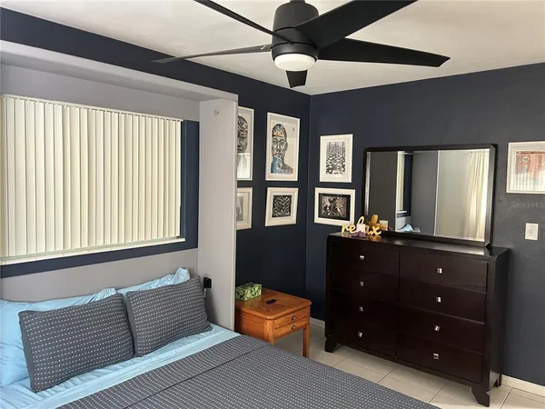 a kitchen with a sink stove and refrigerator
