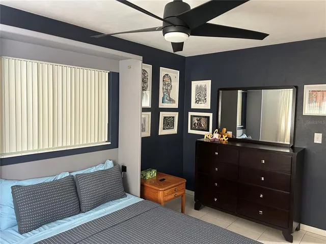 a kitchen with a sink stove and refrigerator