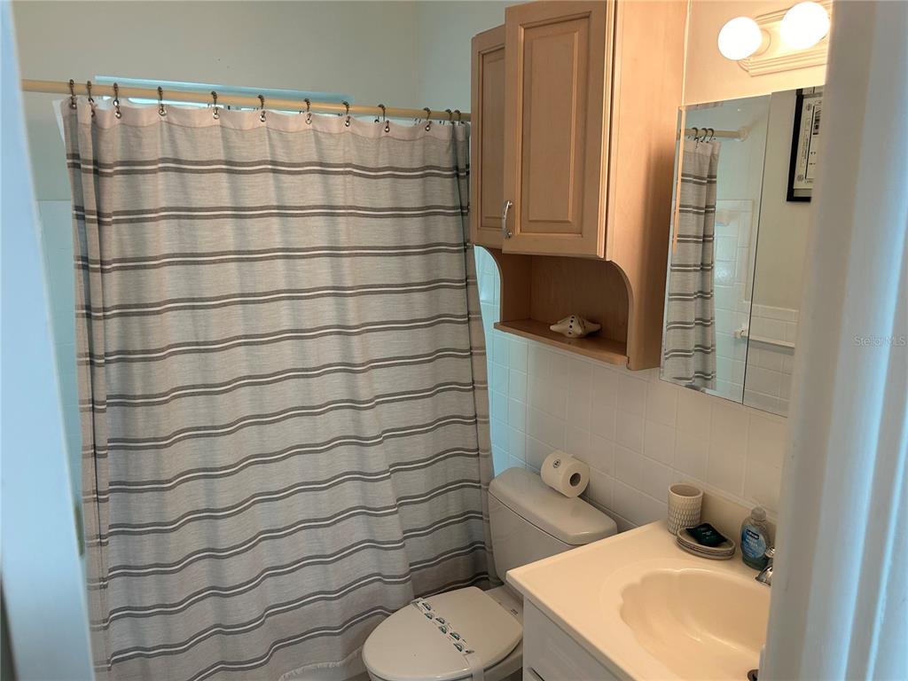 10172 63rd Avenue North Seminole, FL 33772 - Photo 17 of 24 a bathroom with a toilet and a sink
