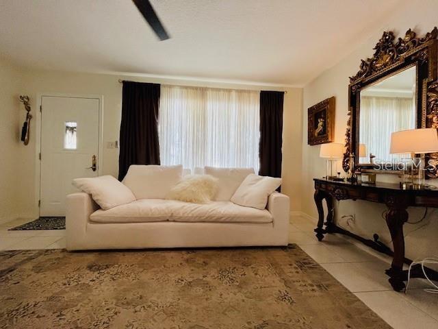 10172 63rd Avenue North Seminole, FL 33772 - Photo 4 of 24 a living room with furniture and a window