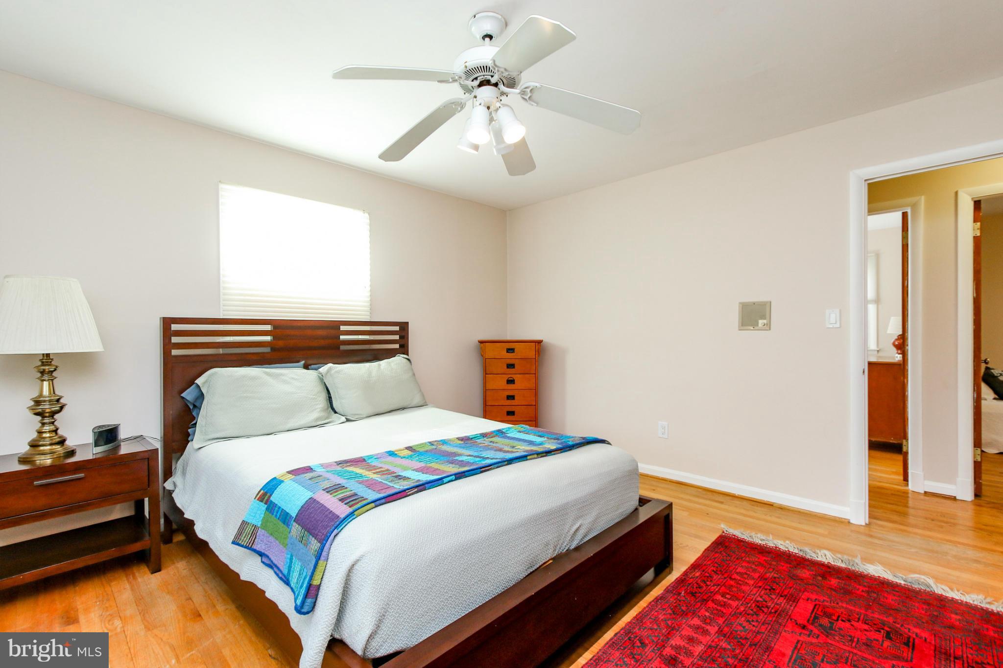13201 Clifton Road Silver Spring, MD 20904 - Photo 9 of 30 a bedroom with bed and window
