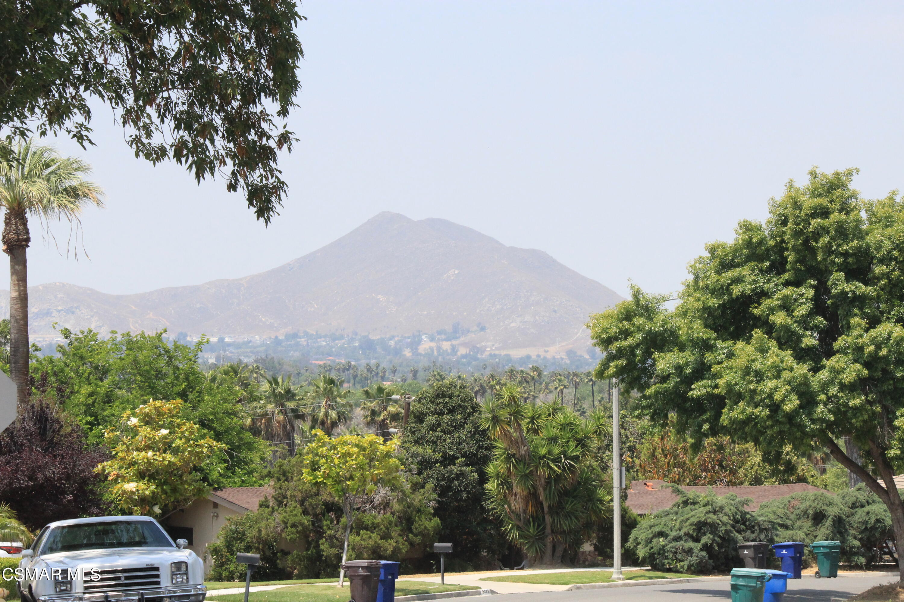 5622 Jurupa Avenue Riverside, CA 92504 - Photo 9 of 9 a view of a cars park on the side of a road