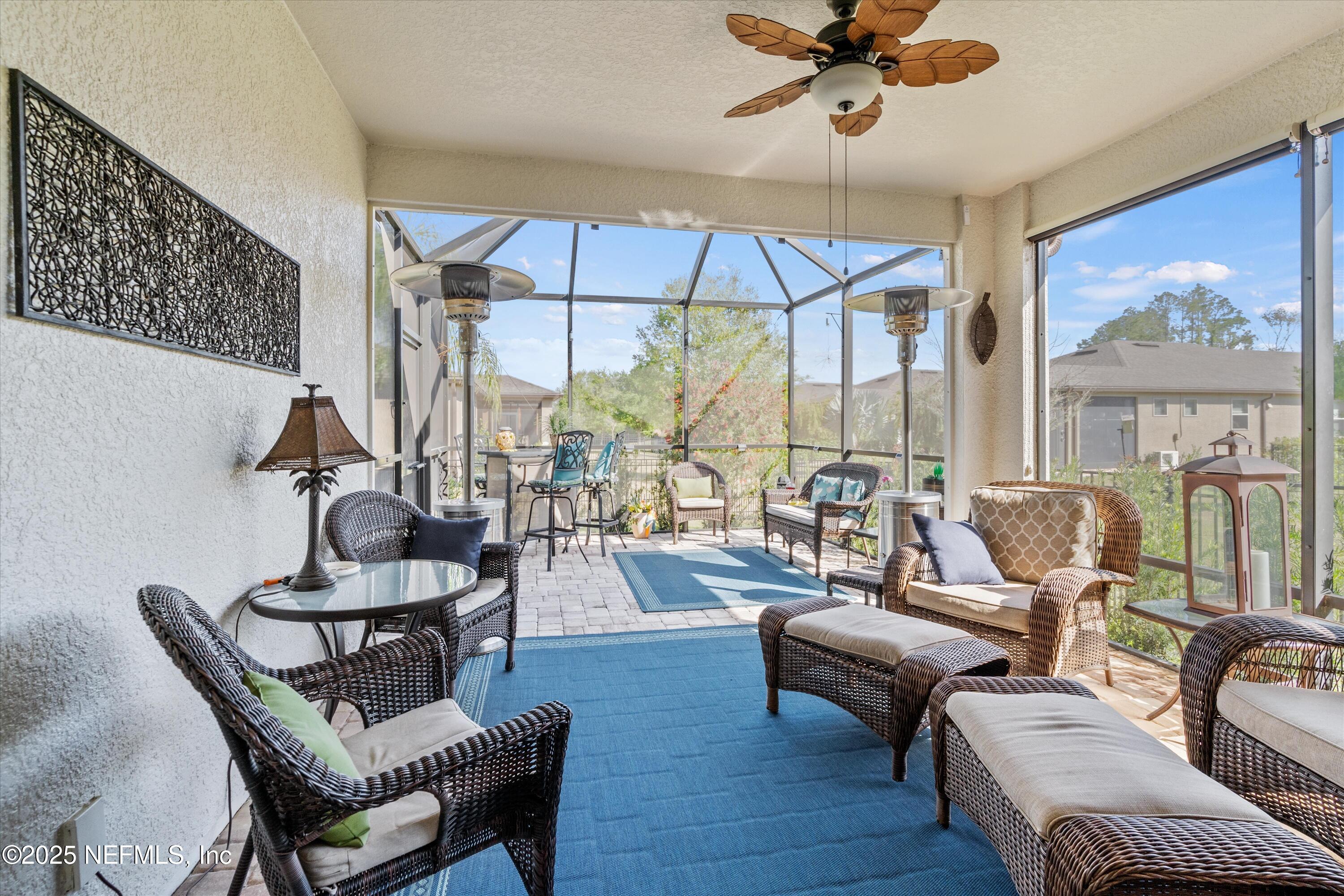 440 Winding Path Drive Ponte Vedra, FL 32081 - Photo 17 of 35 a living room with furniture and a large window