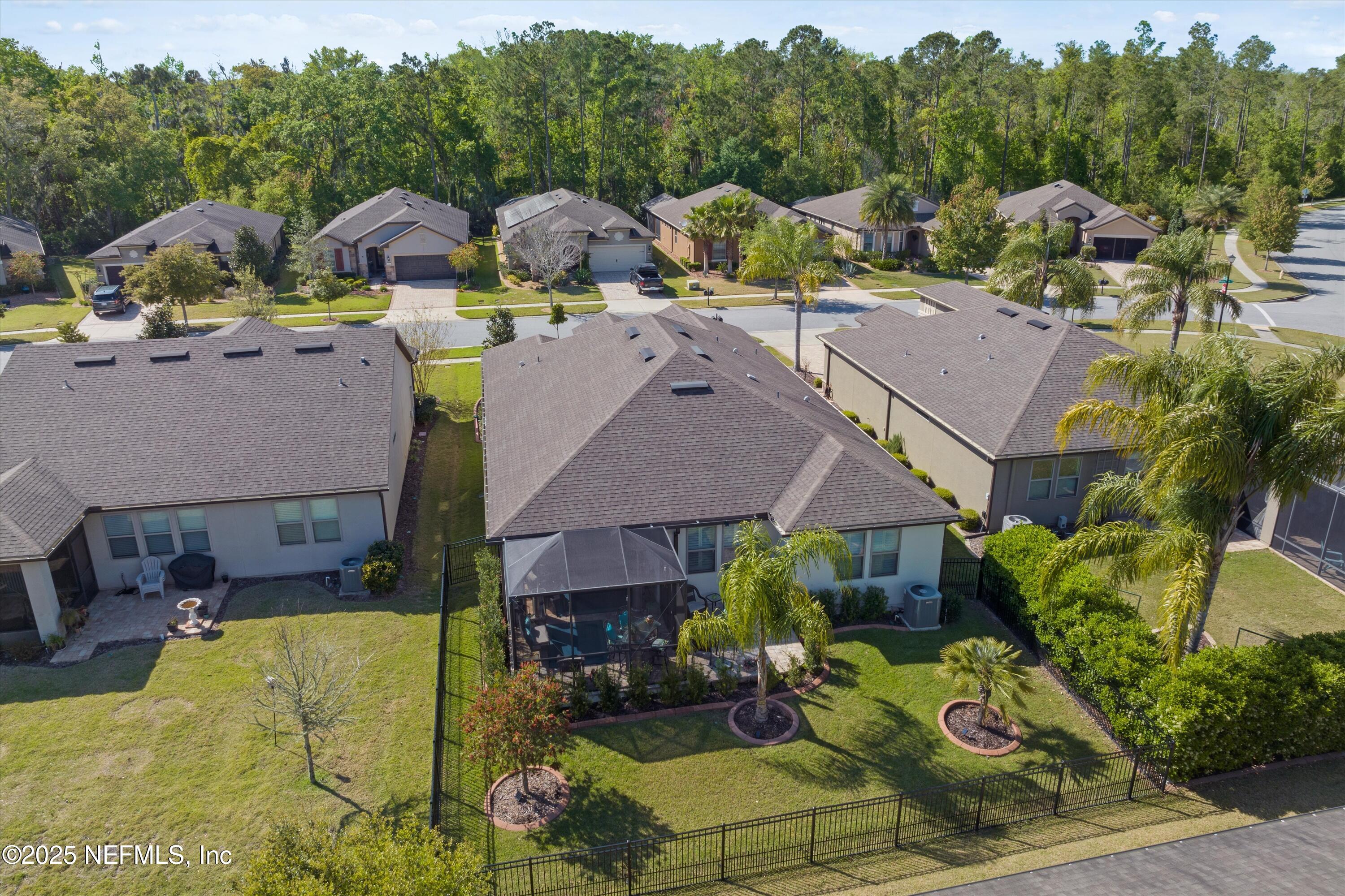 440 Winding Path Drive Ponte Vedra, FL 32081 - Photo 27 of 35 a aerial view of a house with swimming pool and furniture
