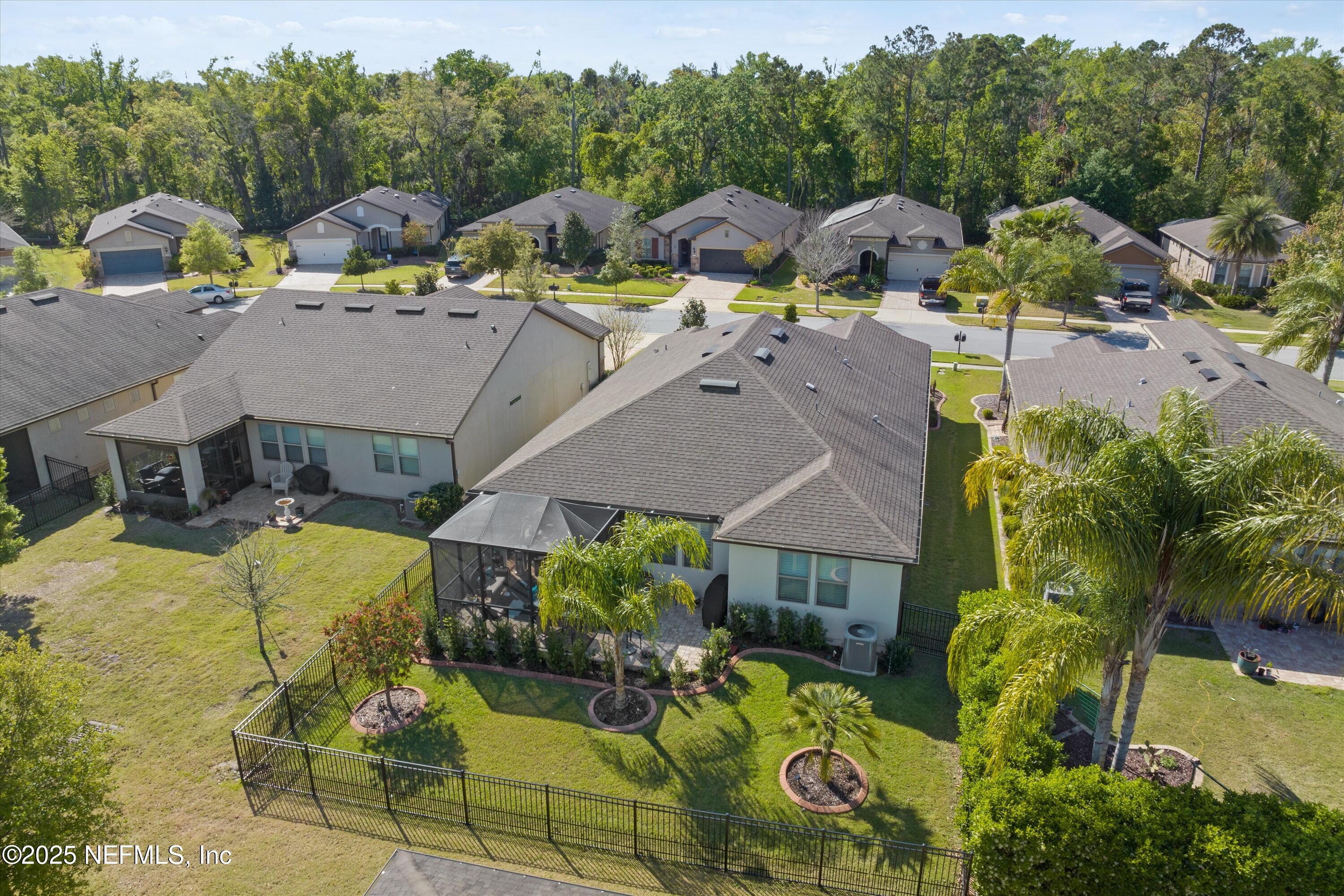 440 Winding Path Drive Ponte Vedra, FL 32081 - Photo 28 of 35 a view of a house with a swimming pool and outdoor seating