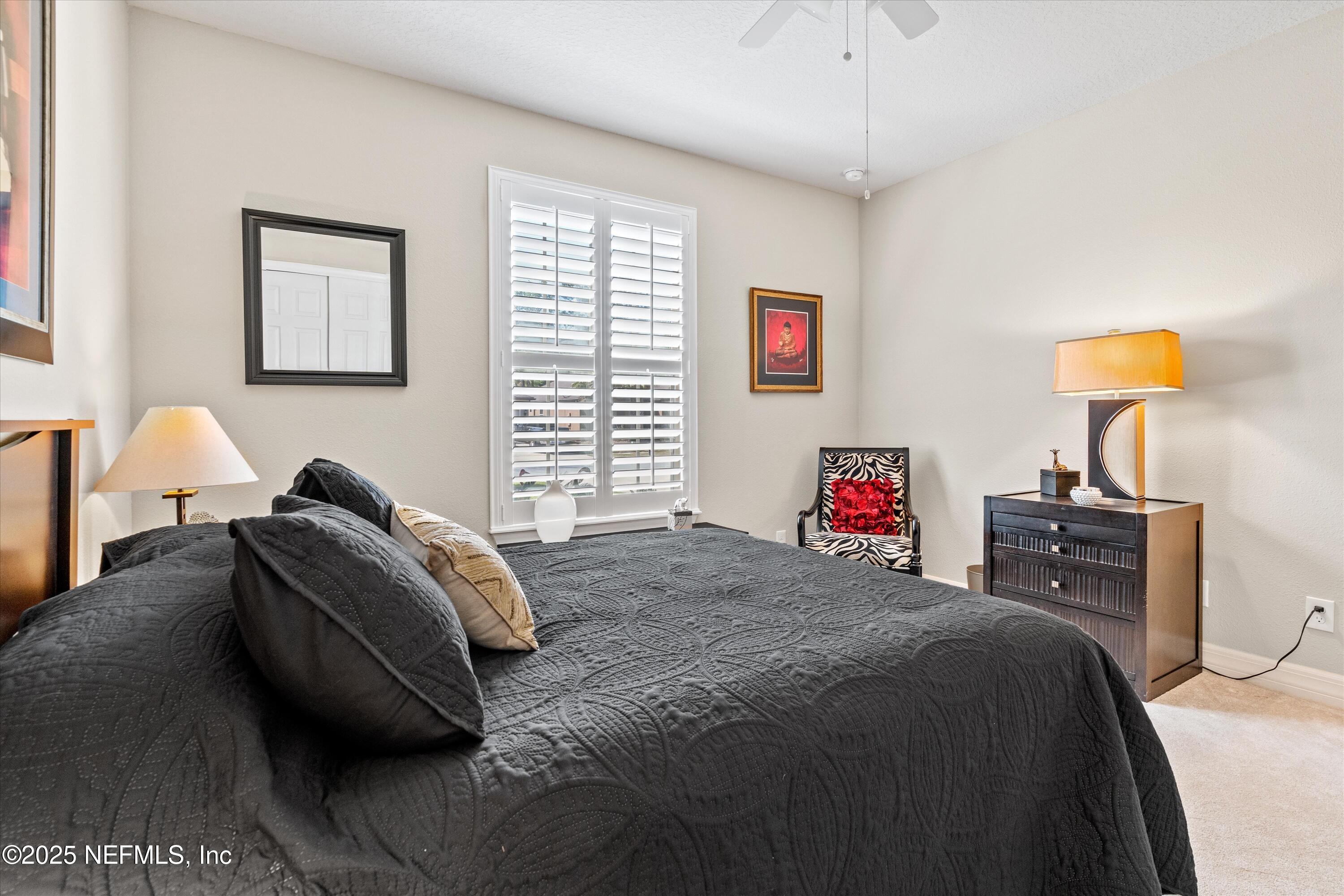 440 Winding Path Drive Ponte Vedra, FL 32081 - Photo 4 of 35 a bedroom with bed and a window