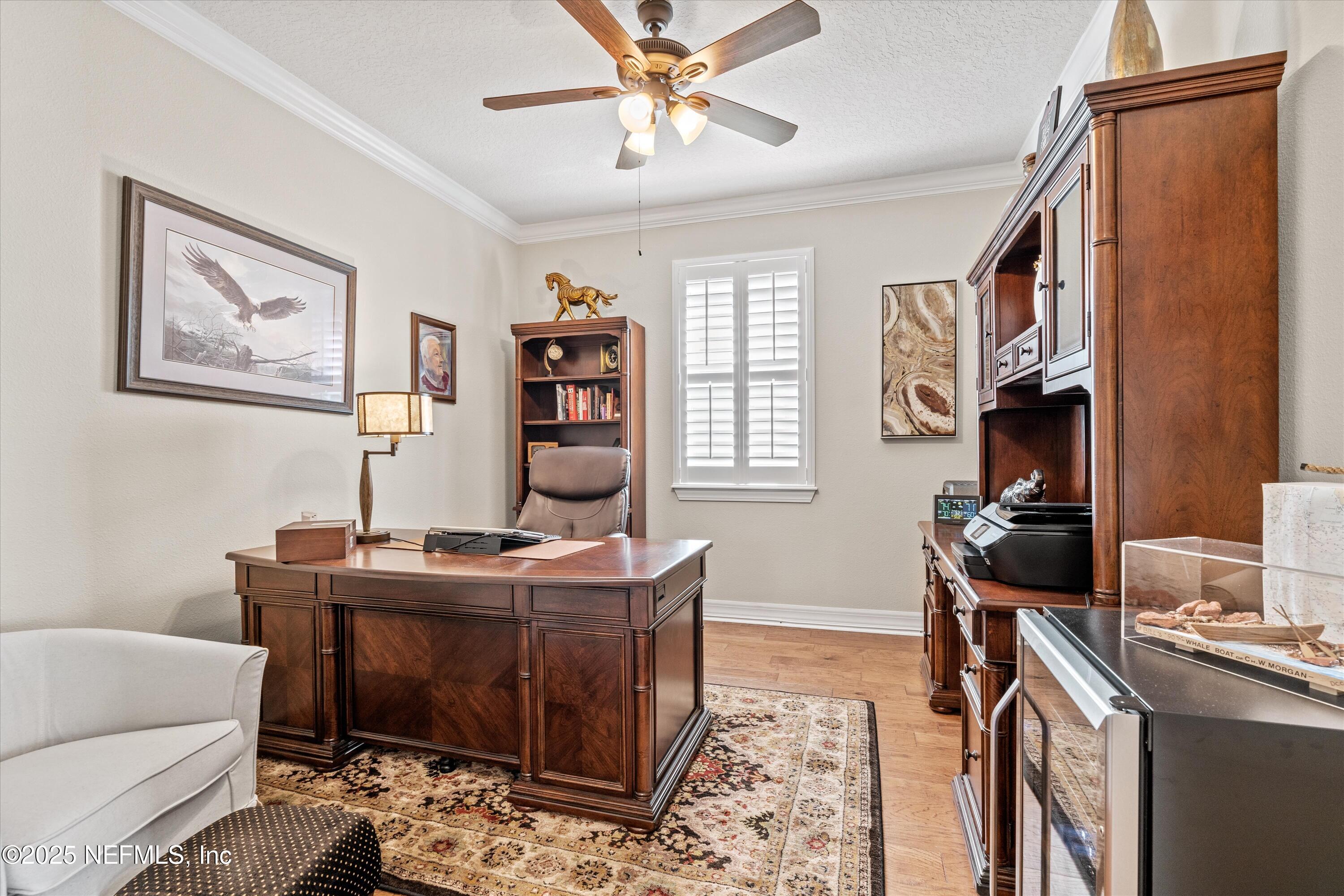 440 Winding Path Drive Ponte Vedra, FL 32081 - Photo 7 of 35 a view of a workspace with furniture and a window