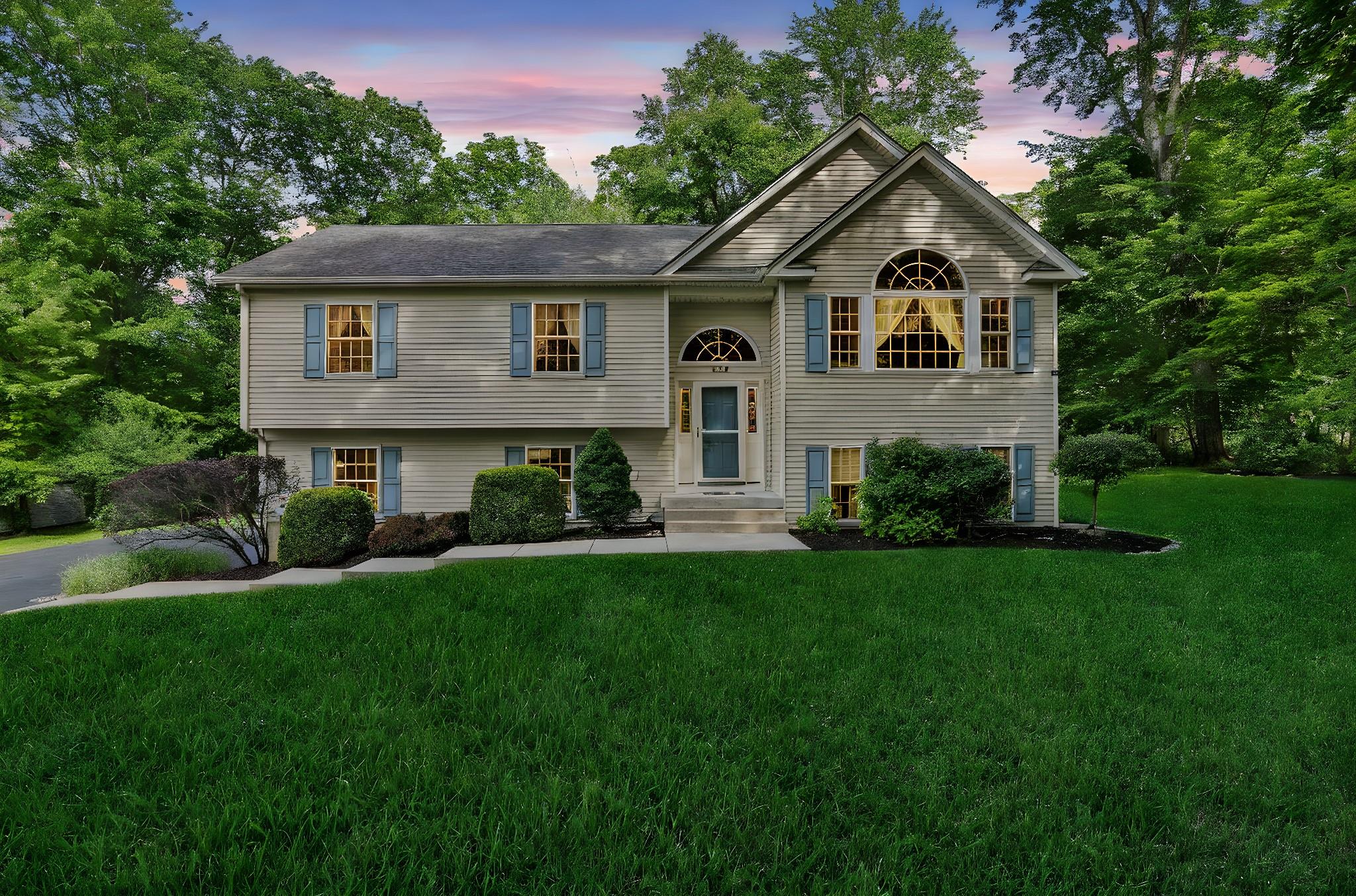390 Lakeside Road Newburgh, NY 12550 - Photo 1 of 1 Bi-level home featuring a front lawn