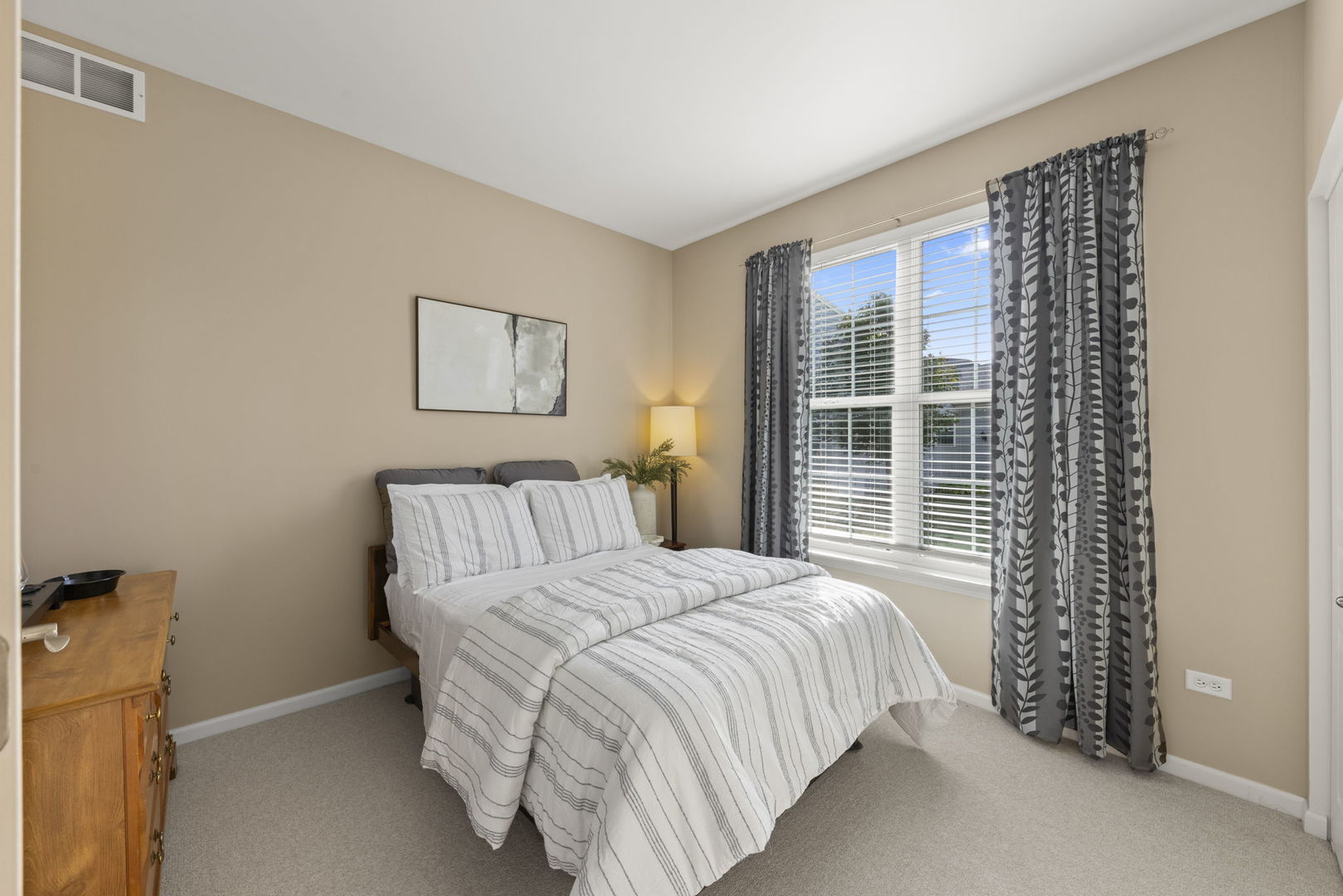 929 Fairmont Road Pingree Grove, IL 60140 - Photo 23 of 28 a bedroom with a bed and a window